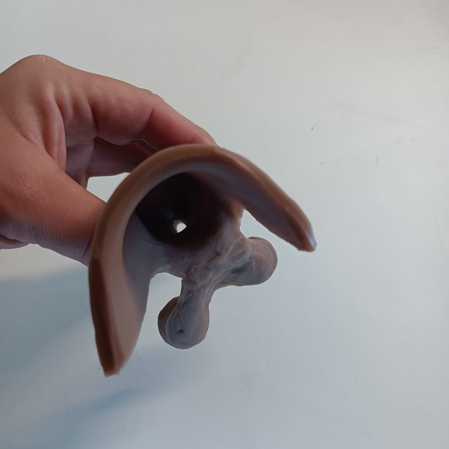 Image showing the inside of the 5 inch STP Skin. Showing how the top and shaft are made with hollow and thin, stretchy, silicone.