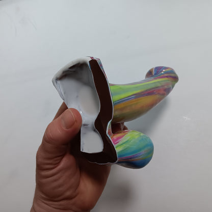 Left view of the underside.  The underside is mostly white with brown around the trim.