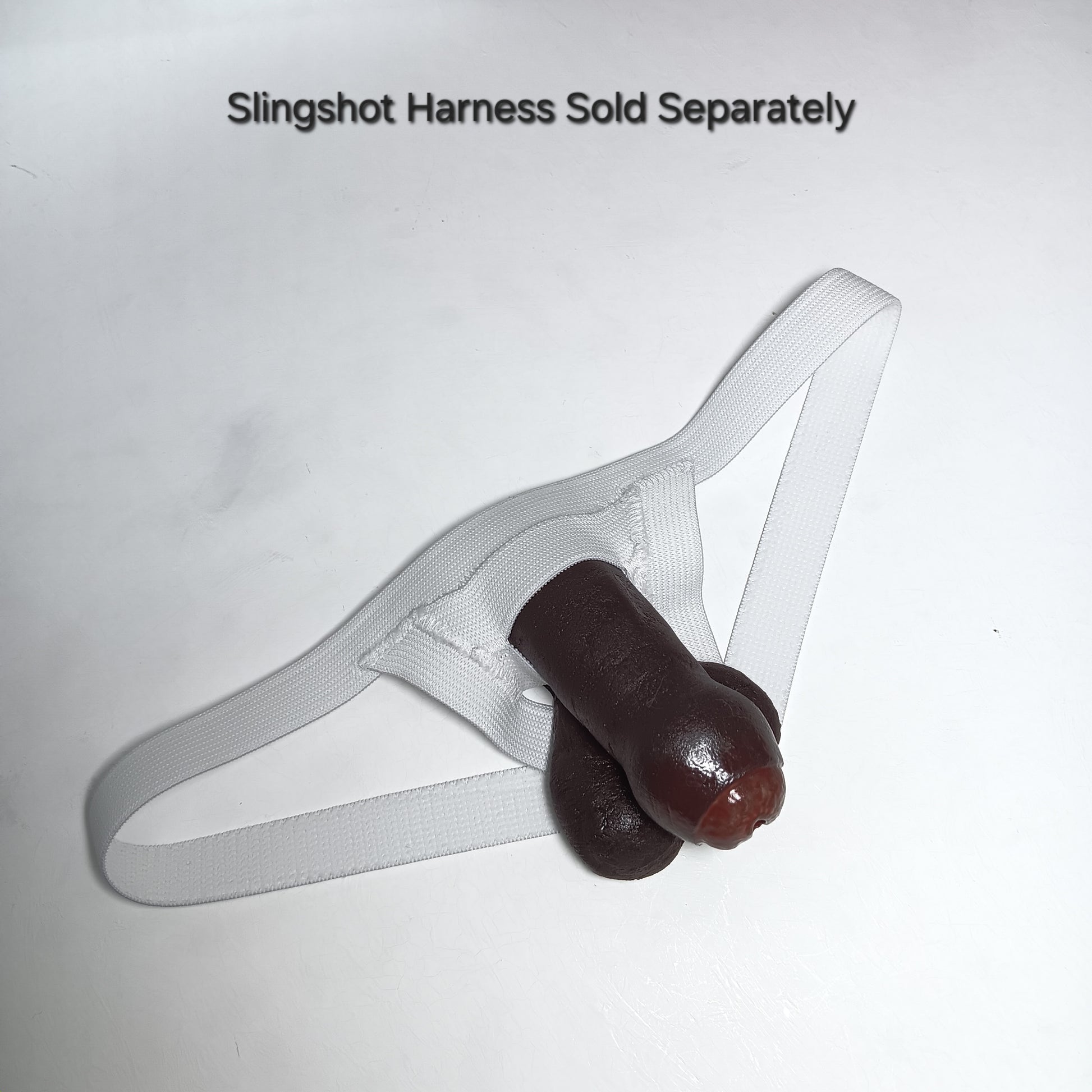Color #8 Uncut 3 inch STP Skin in white fitted Slingshot Harness with text 'slingshot harness sold separately' 