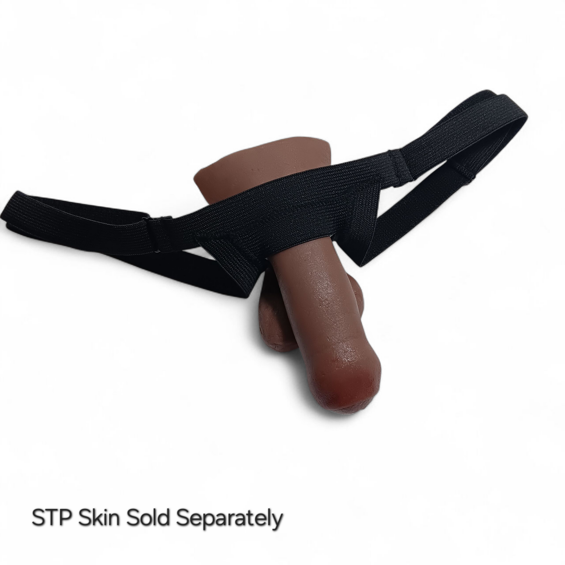 Image of a 4 inch STP Skin in a black adjustable Slingshot harness on a white background.