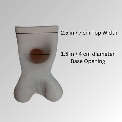 Illustration of the back of a 5 in action toy showing the hole inside the base for the wearers anatomy to go into.  The opening of the hole measures 1.5 in / 4 cm diameter.  Also the top of the base measures 2.5 in / 7 cm across.