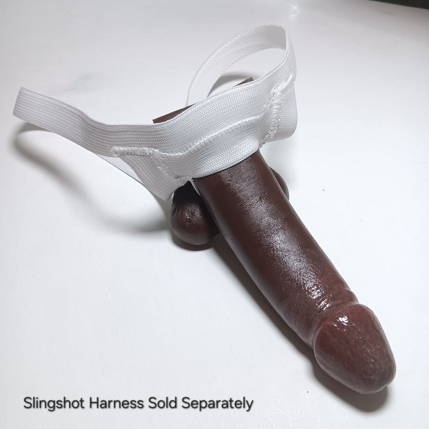 5 inch Action Toy in a white Slingshot Fitted harness.