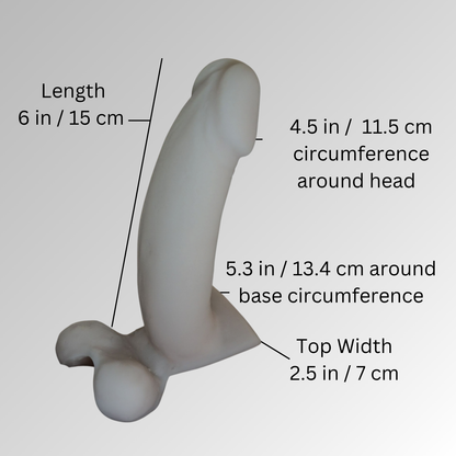 illustration showing measurements for the 6 in / 15 cm Action Toy length from base to tip 6 in / 15 cm,  circumference around head 45 in / 11.5 cm.  Circumference around base 5.3 in / 13.4 cm.  Top width of the base- 2.5 in  7 cm