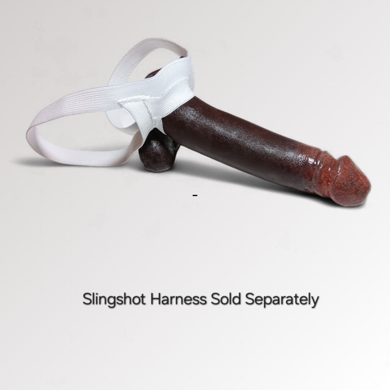 7 inch Action Toy in color #8.  Holstered in a white Slingshot harness on a white background.  Small text under reads 'Slingshot Harness Sold Separately'