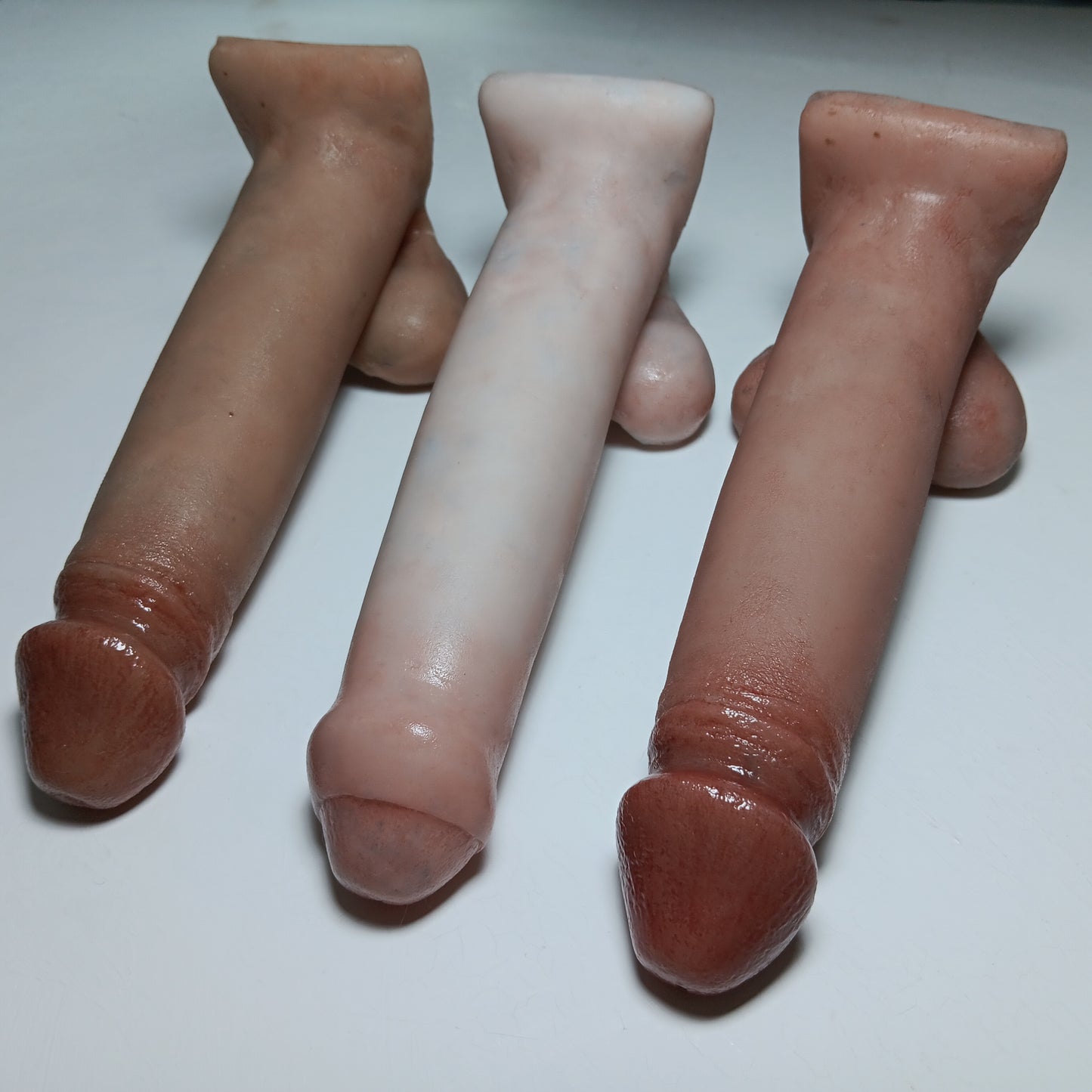 7 inch realistic Action Toy prosthetics by Number One Laboratory.  Demonstrating color options.