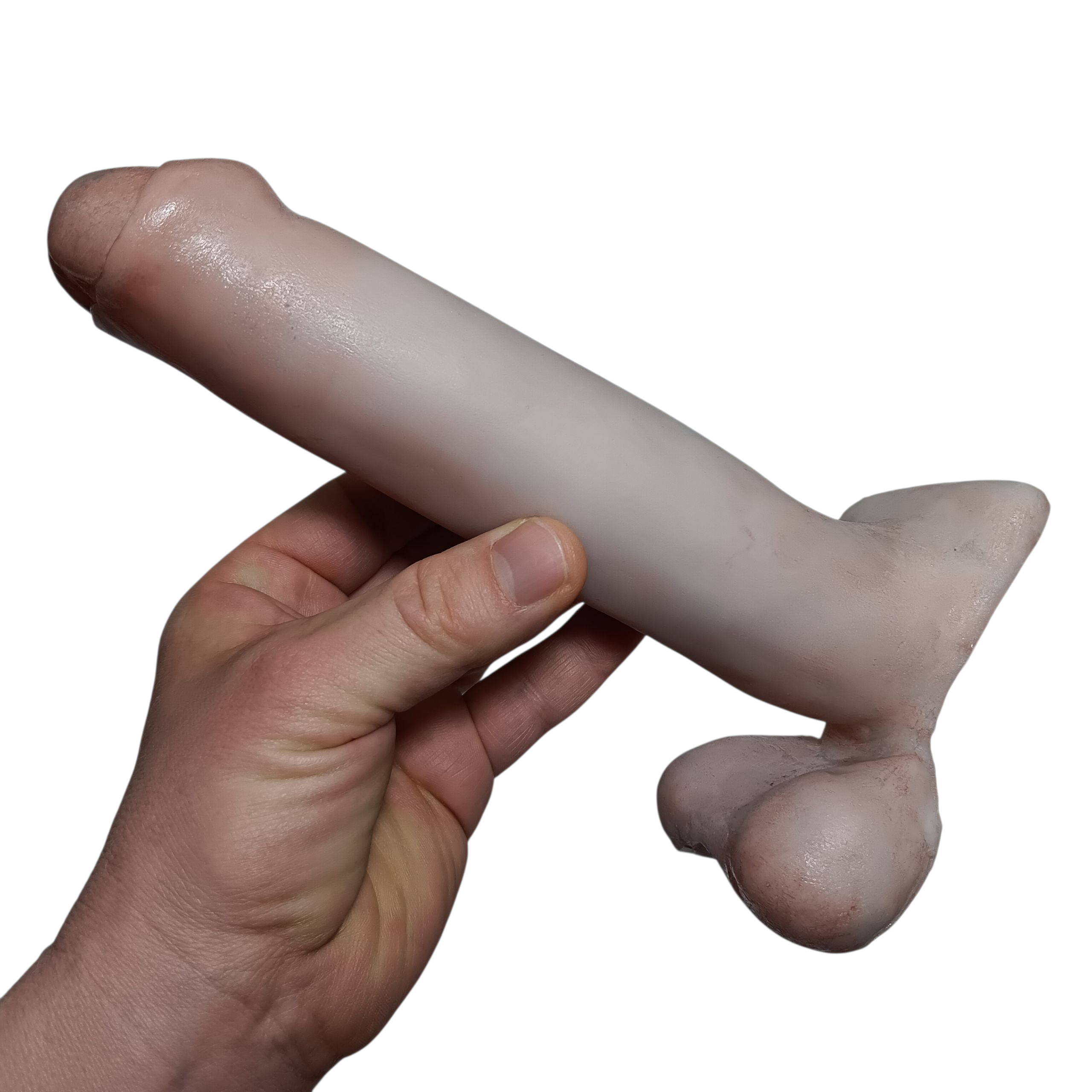 7 inch SQUEEZE Action Toy by Number One Laboratory in hand on white background.