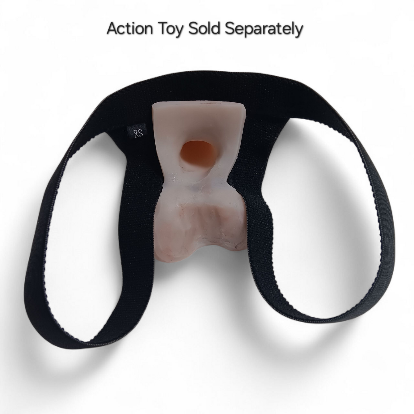 Showing the inside of the Sling Shot Fitted harness with the Squeeze Action Toy inside.  The sling shot harness has 2 elastic straps that loop around each thigh, the Action Toy sits in the center.  The backside of the toy is hollow to provide suction.