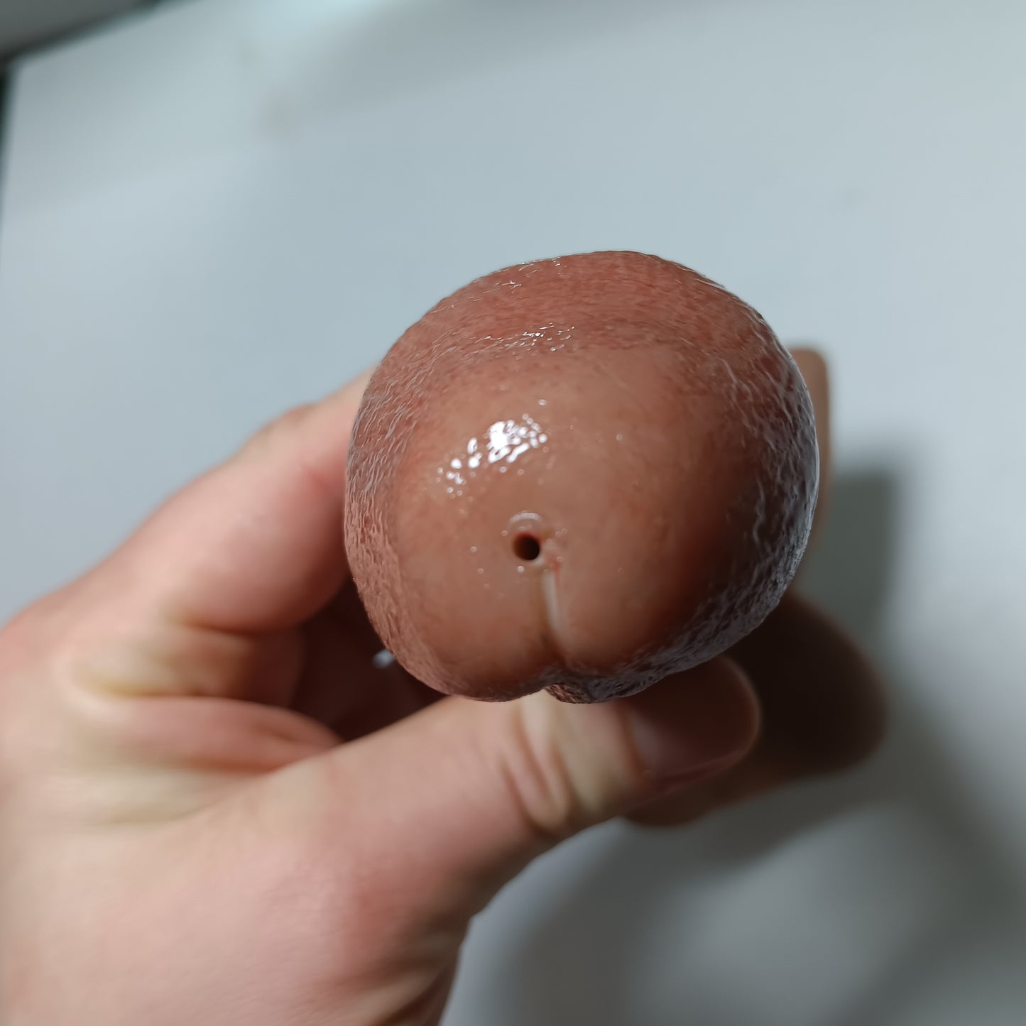 Close up of the B.J.E.J. head shown from top down- showing the small hole in the head for suction and ejection.