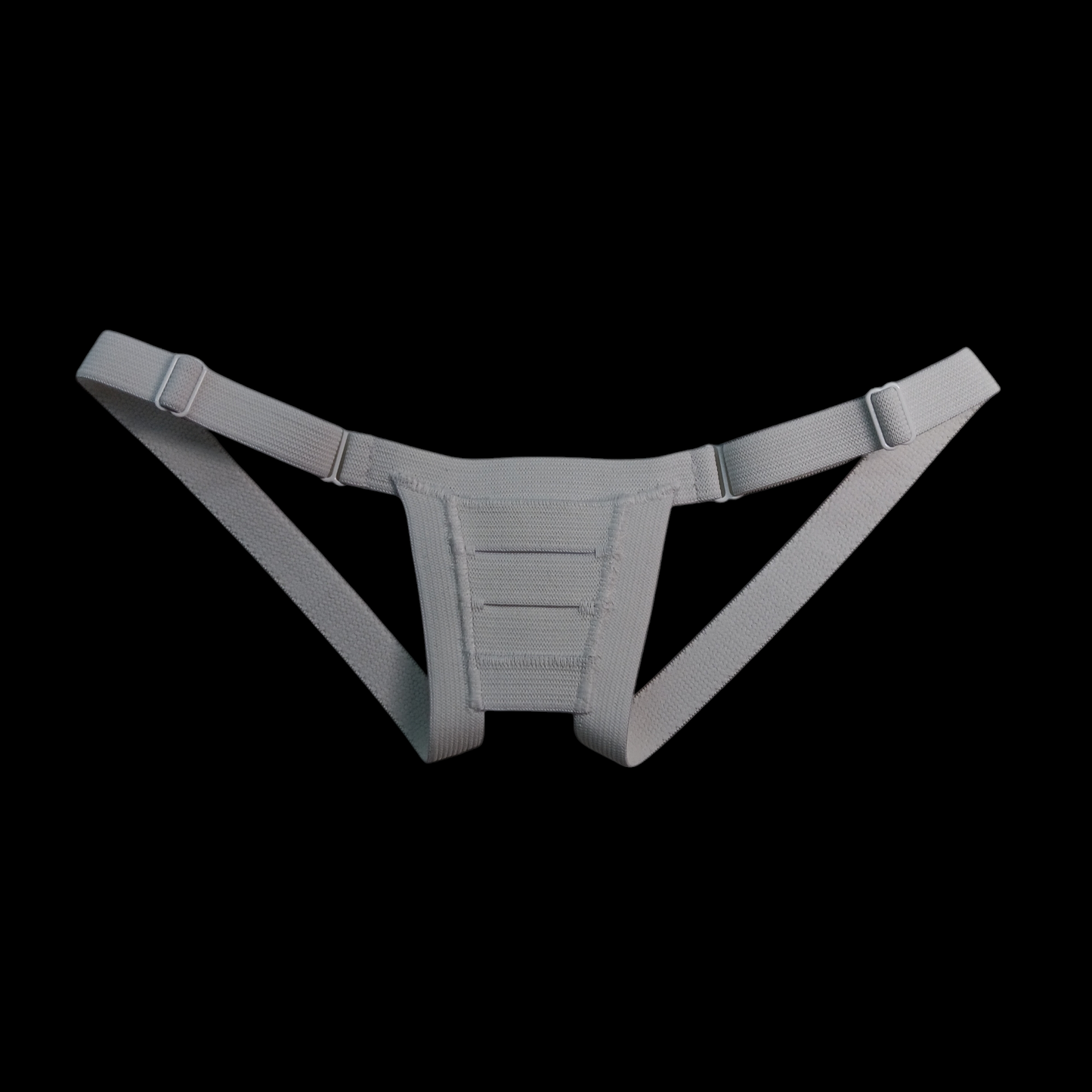 Image of a white Adjustable Slingshot Harness on a black background