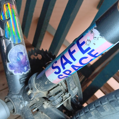 Image showing a well worn Safe Space sticker on my bicycle.