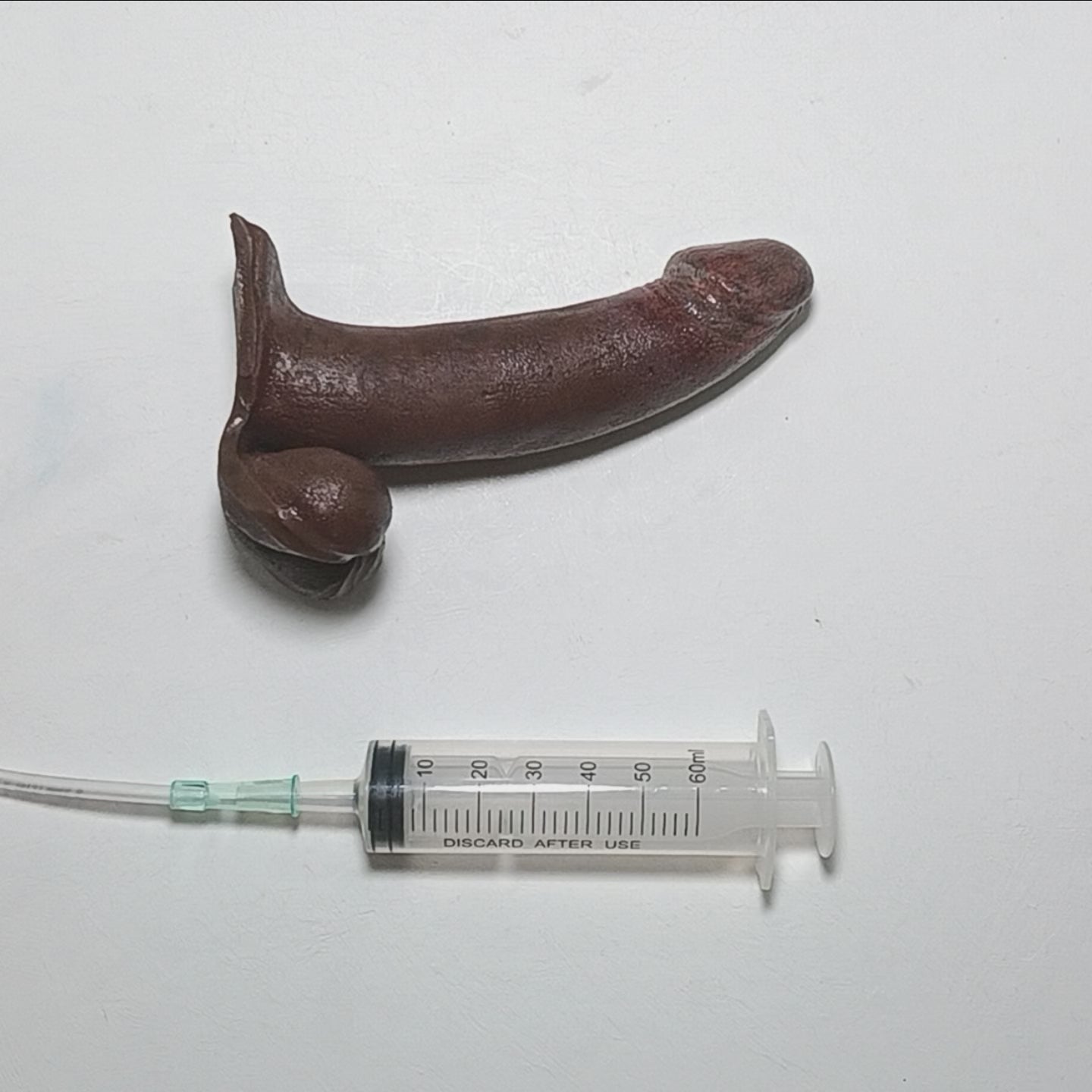 Short video showing the 6 inch B.J.E.J. realistic prosthetic action toy with ejection Syringe.