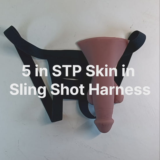 Short video of the 5 inch STP Skin being holstered in the Slingshot harness.