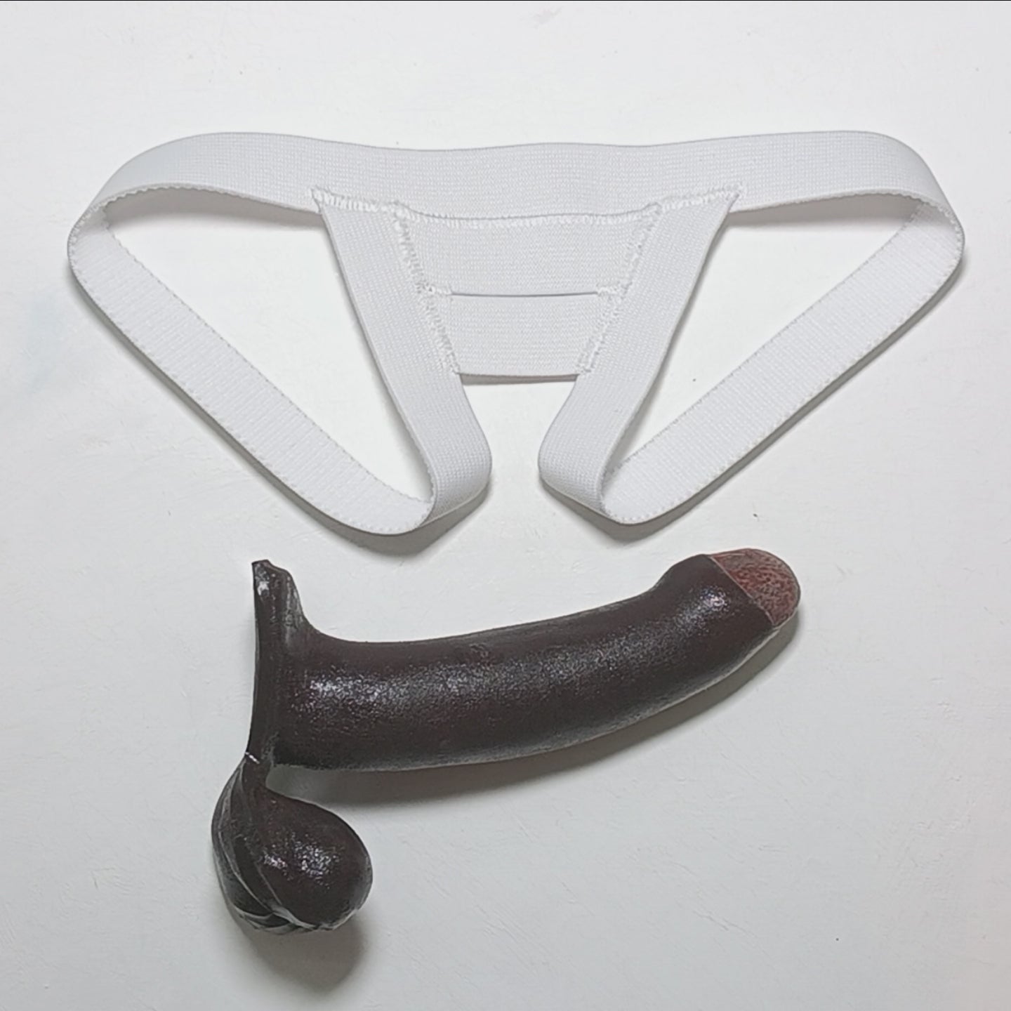 Video showing the 6 inch Action Toy in the Slingshot Harness by Number One Laboratory.